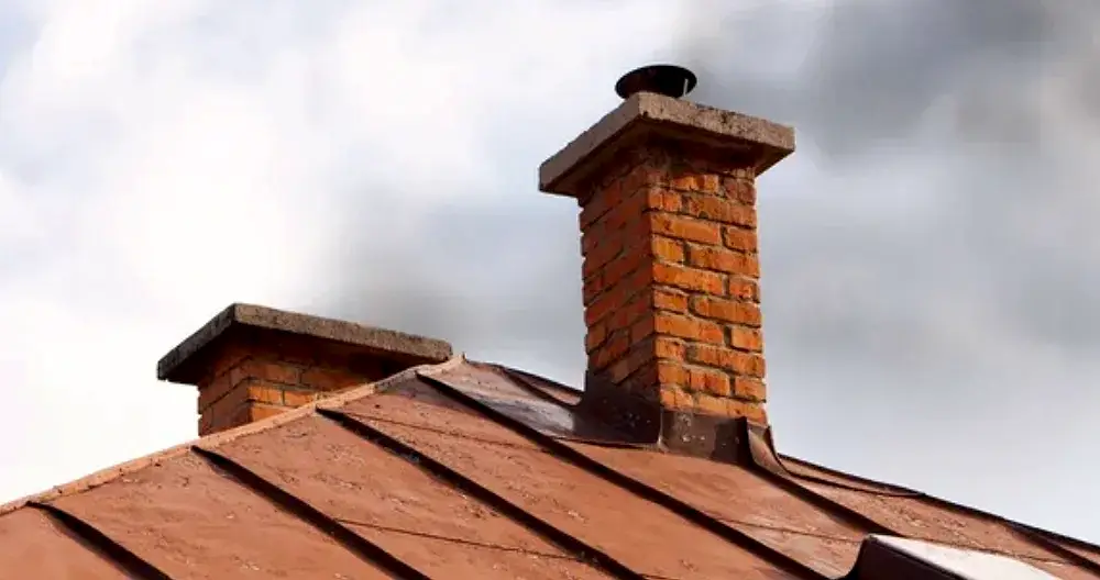 Brick chimneys on the roof of a home